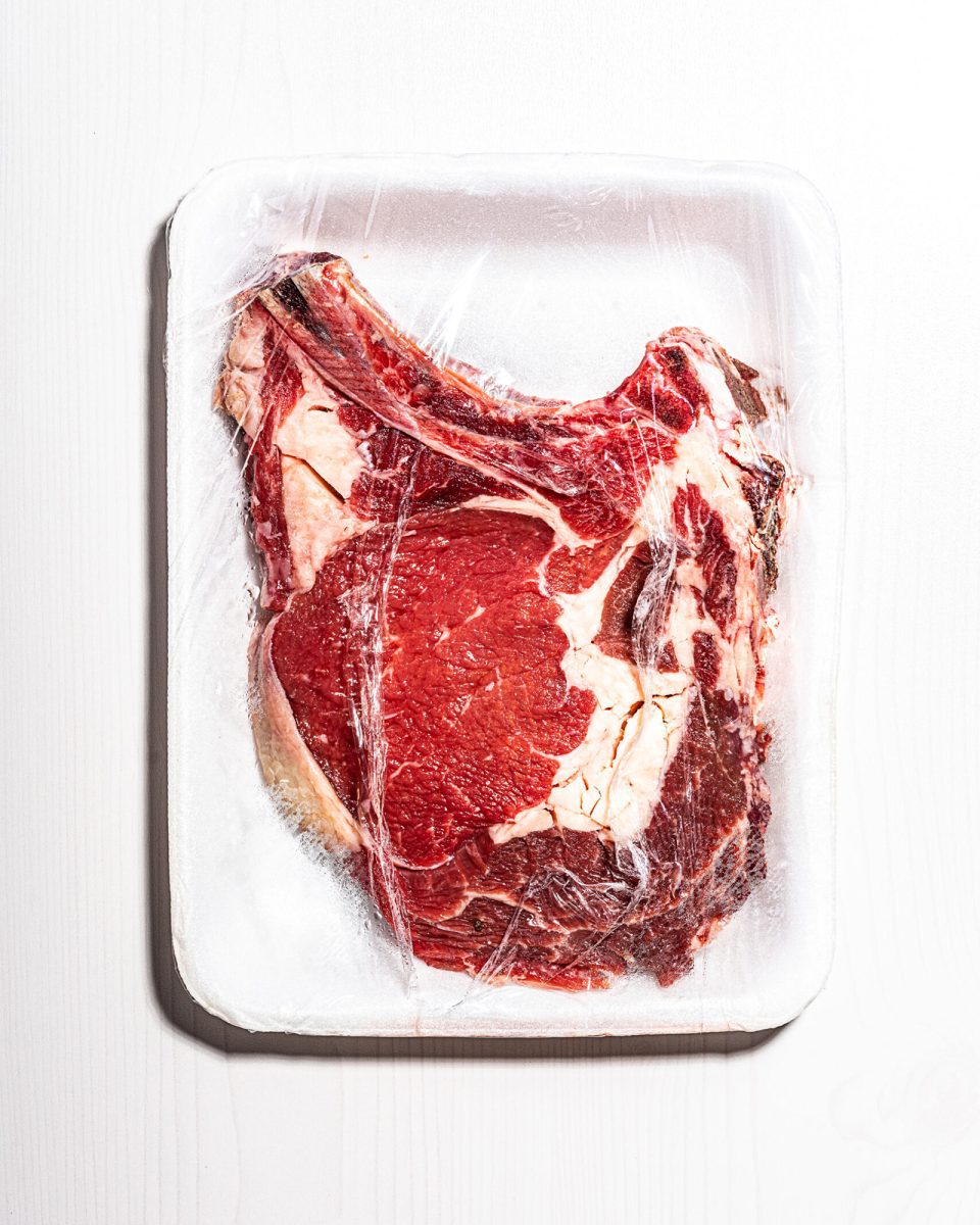 High-quality product photography in Italy by Andrea Pol, featuring a packaged raw steak against a white background